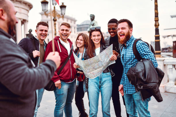 Tour Guide Showing City To New Tourists - Clare Volunteer Centre